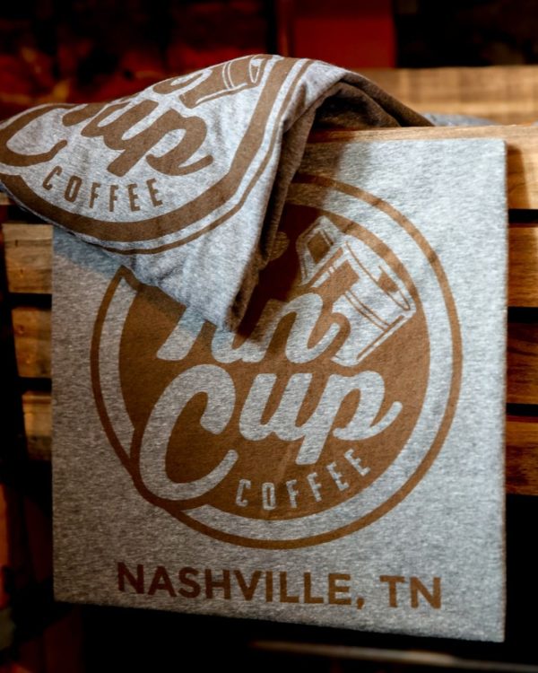 Folded gray & brown Tin Cup Coffee Company t-shirt, Merchandise, Nashville. TN