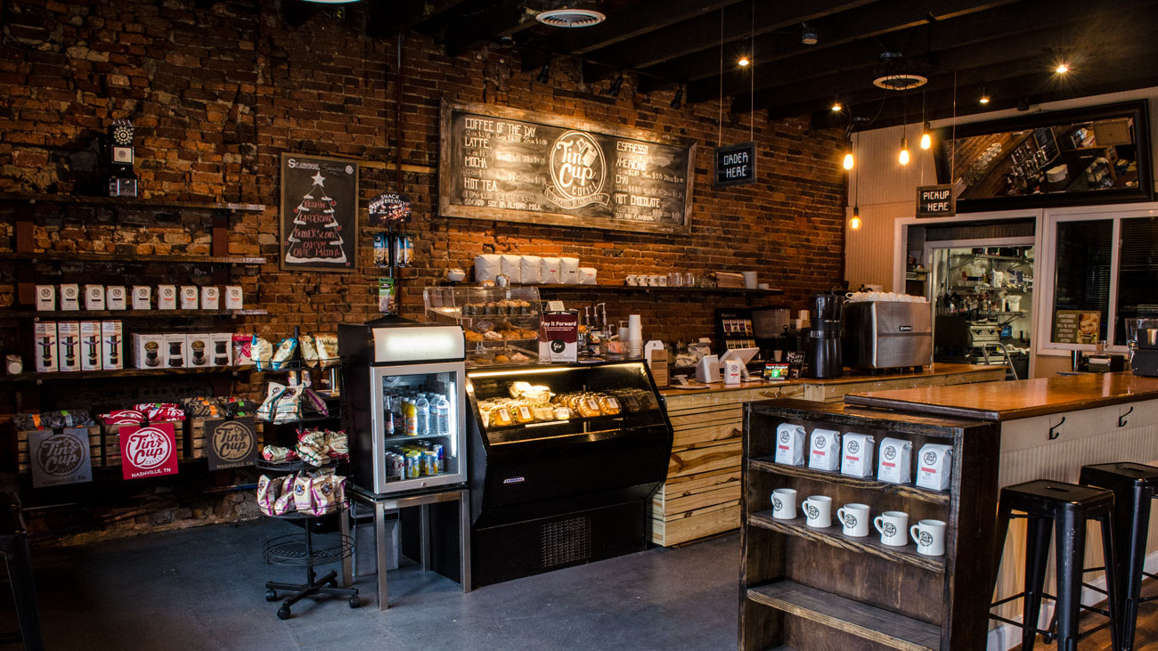View of the counter, merchandise and menu - Tin Cup Coffee Company Nashville, TN